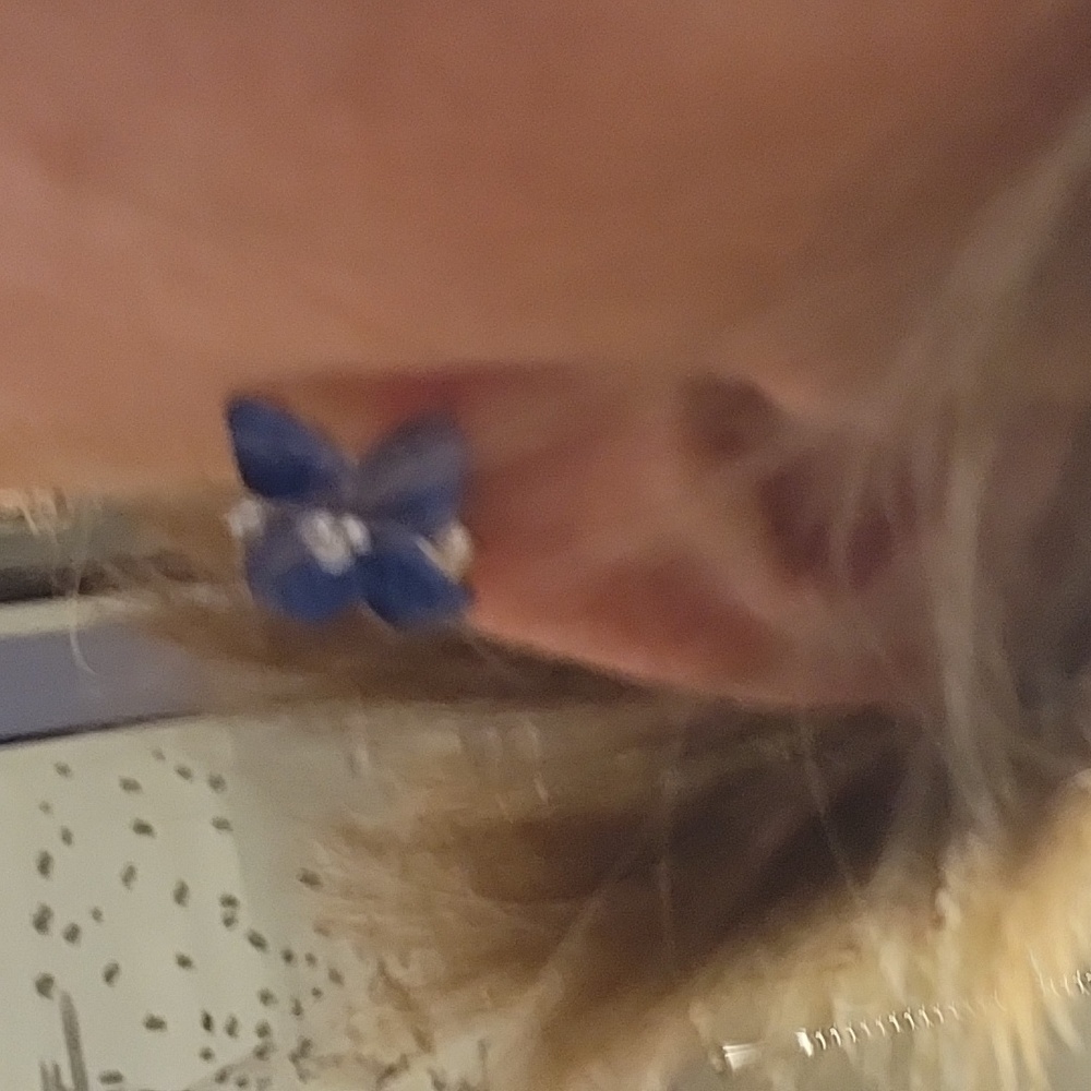 Pierced blue flower earrings